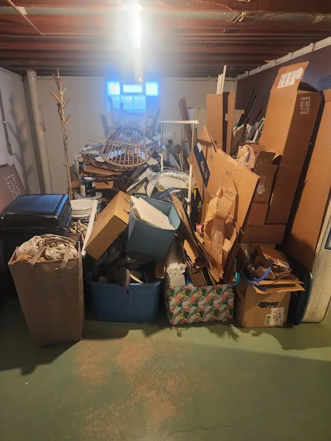 Roll-off dumpster container at job site for Yard Waste Dumpster Rental in Raleigh